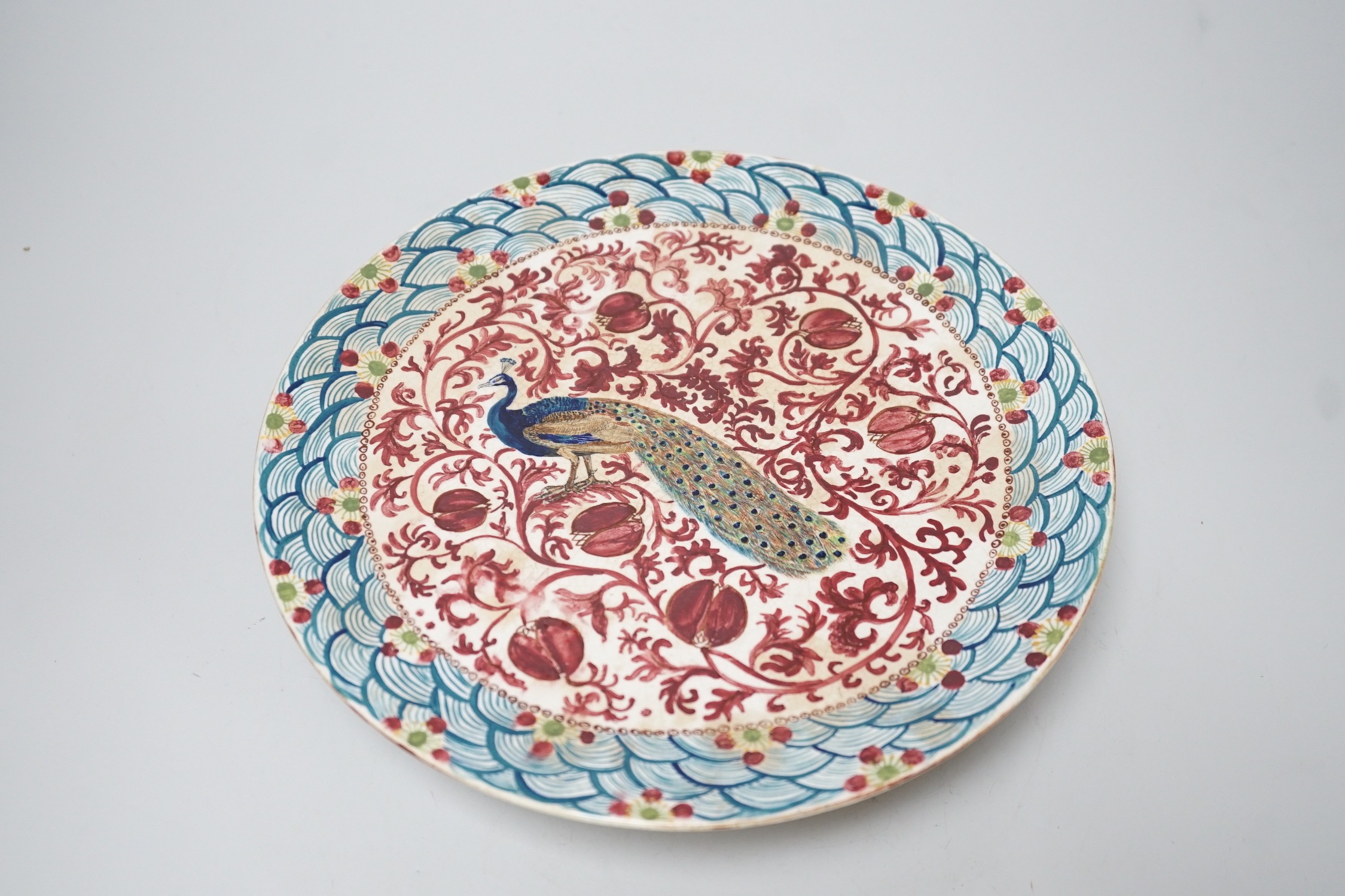 A late 19th century art pottery comport in the style of De Morgan, 25cm diameter